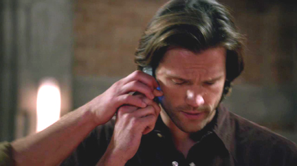 Dean grabs the phone away from Sam...